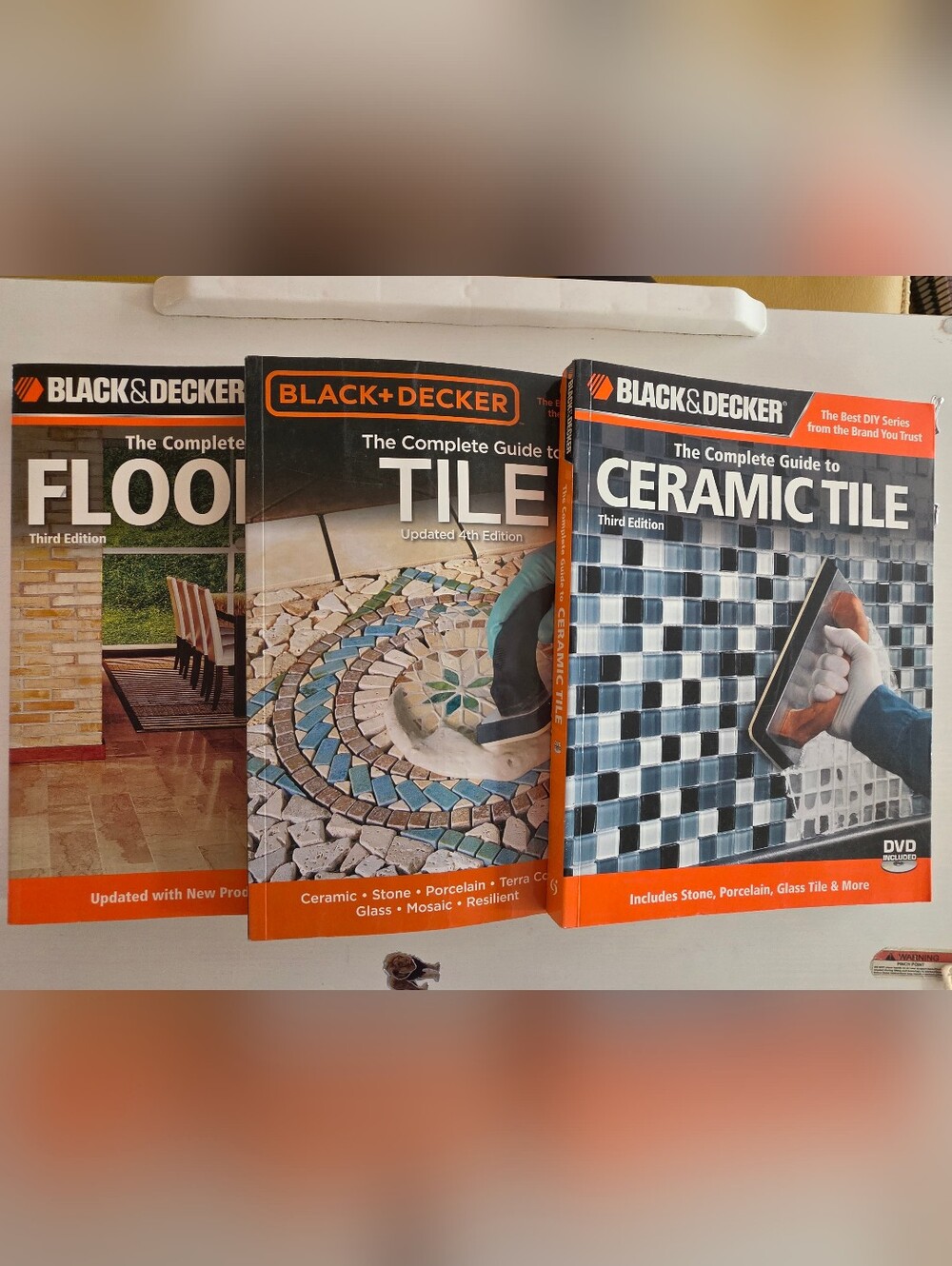 Black & Decker Tile & Ceramic Tile Guide Books with Orange and Black Accents